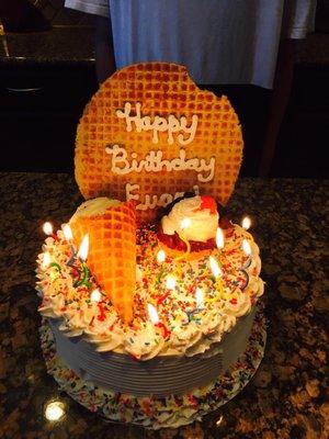 Birthday cake ice cream with fudge. My son took a bite of the waffle circle before I snapped the picture. It was that yummy!