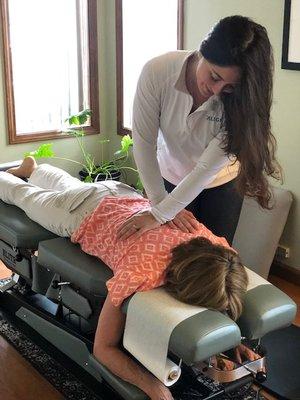 Dr. Allison adjusting a patient.