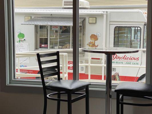 Food truck parked out front.