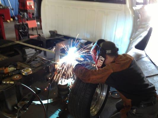 Mark welding Super C notches in my sport truck