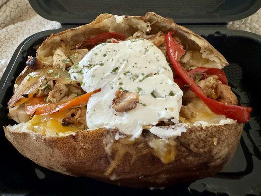 Baked potato-grilled chicken-veggies-sour cream   So good! Very large, enough for leftovers