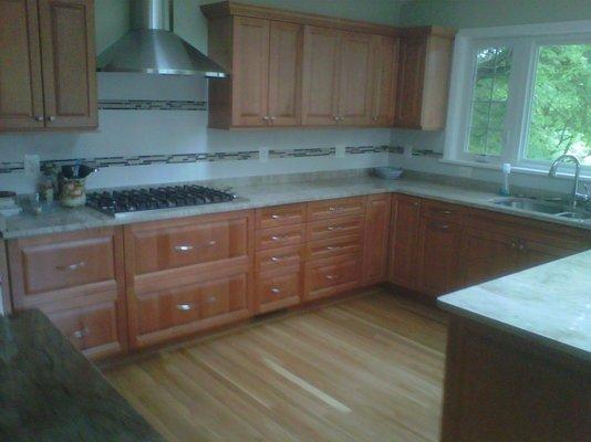 Custom cabinets, counter tops, and wooden floors. Why ask for premade, if you plan on cooking homemade?