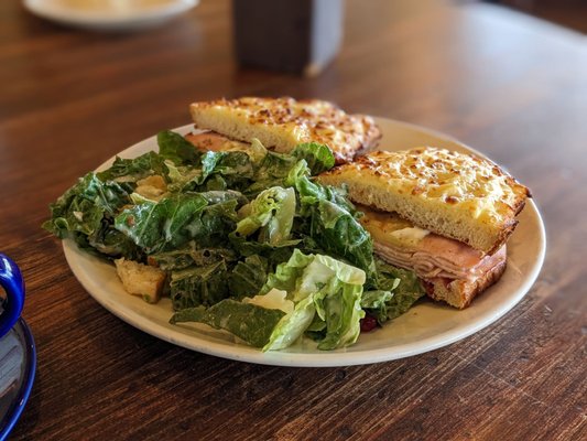 Turkey and cranberry croque with a side Cesar salad