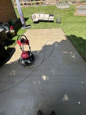 Pressure washed back patio.