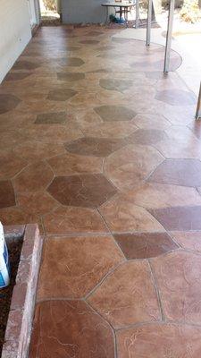 Hand troweled and hand sponged two color simulated flagstone overlay