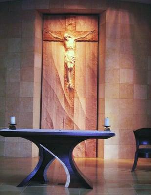 New Crucifix hand carved wood by artists in Peru, along with a new Altar, ambu and chairs, surrounded by Jerusalem stone tile.