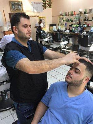 Ahmed the barber, experience, confidence and versatility. Razor master and over a decade of experience.