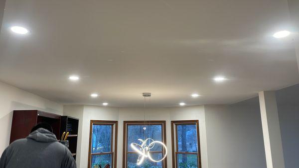 Customer wanted a different look for his dining 
room, nothing a fixture and recessed lights can't beat