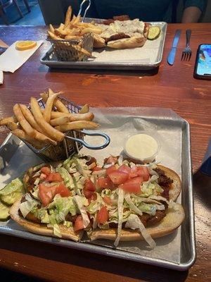 Buffalo chicken sandwich with fries & chicken Parmesan sandwich with fries