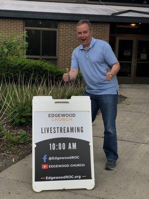 Pastor Doug at their newly purchased building 111 East Jefferson Rd.