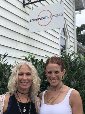 Co-founders Melanie Struble & Jen Kraft with new Body Positive Works sign!