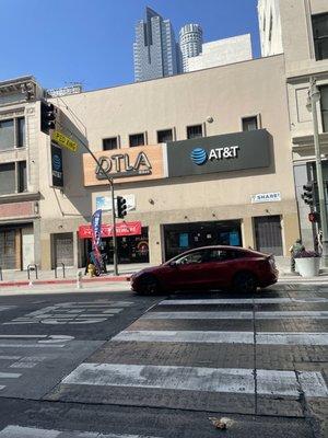 Storefront. Parking in garage across street or street parking.