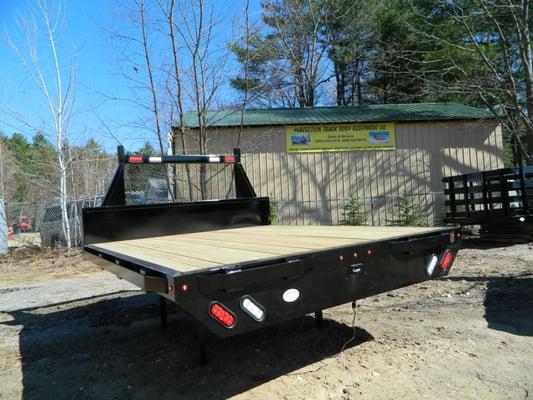 QUALITY CUSTOM BUILT FLATBEDS. This is a 9 FT DRW, PT T&G Wood Deck, Tapered Headboard, ...