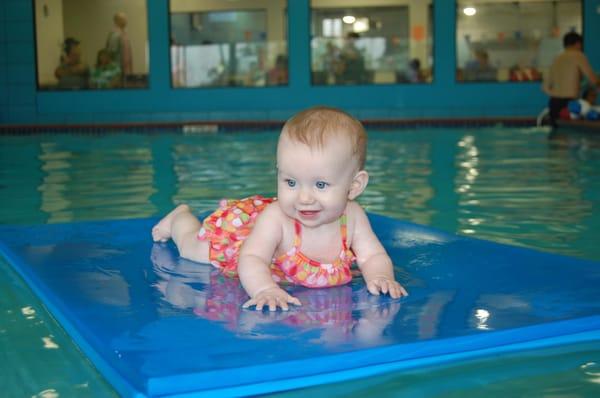 Baby swim lessons. Infant aquatic lessons.