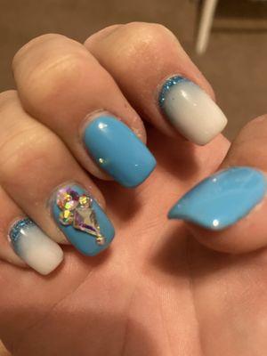 Blue and white cloud nails with glitter undertones and sparkle finish