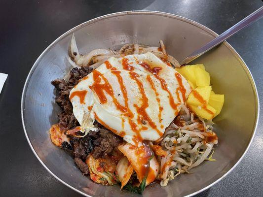 Beef bimbimbop with daikon, onions, bean sprouts, and kimchi