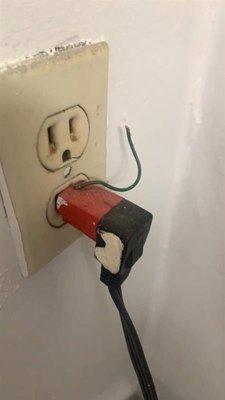 3 prong fridge plugged into a 3-2 prong outlet with an external ground.....that is obviously not grounded.