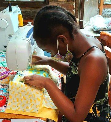 Miss B sewing an organizer for our Back to School week of Summer Camp