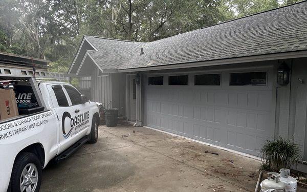 The replacement garage door in port royal plantation Chi stamped shaker tinted windows 
Gray in color