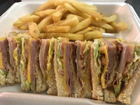 Club sandwich and crispy french fries