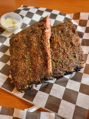 1/2 slab of  St. Louis ribs with 3 different sauces to choose from