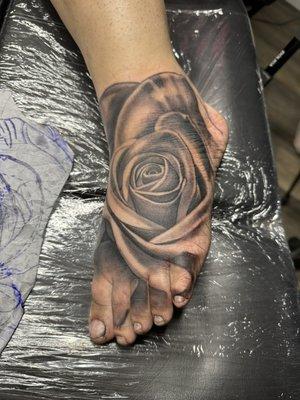 Rose tattoo on foot from the other day