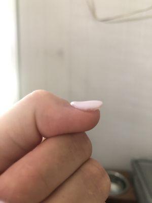 After he re-did my nail, it was still bumpy.