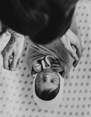 Newborn photography sessions captured in your home.