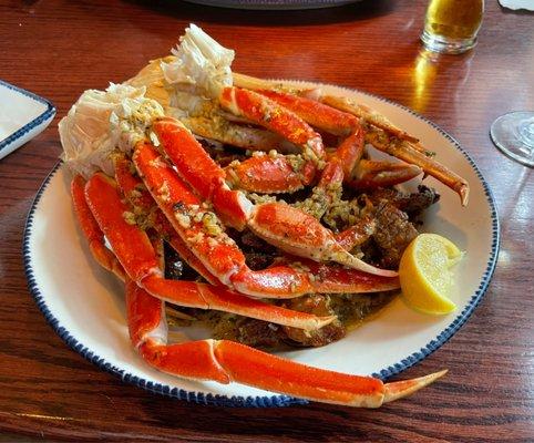 Crab Fest: Roasted Garlic Butter Snow Crab (1 lb) on top crispy potatoes