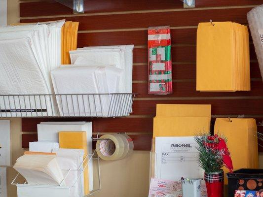 Need some small shipping supplies? Grab an envelope or a roll of tape from our supply shelf!