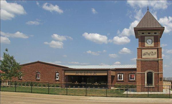 A street side picture of the Museum and the adjoining Clock Tower that houses an 1860 Horz mechanism.