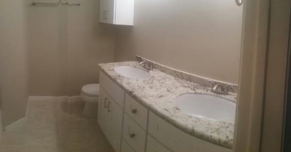 All the old wallpaper removed, new texture, new paint, new granite, new sinks, new backsplash, new faucets