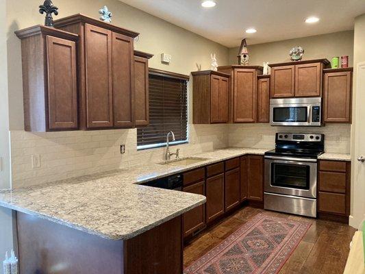 New countertops, sink and tile backsplash