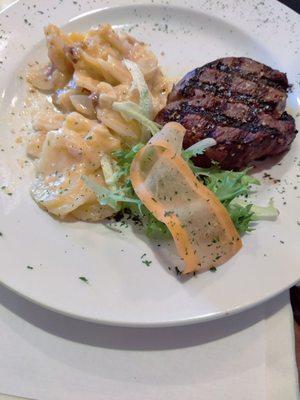 6 oz filet and I'll gratin potatoes, also came with a dinner salad. Filet was flavorful and cooked perfectly