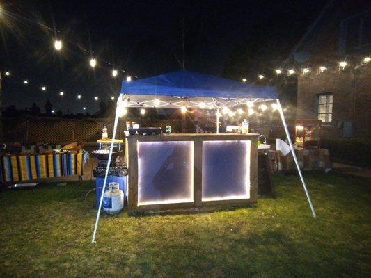 the top shelf Taco stand at night