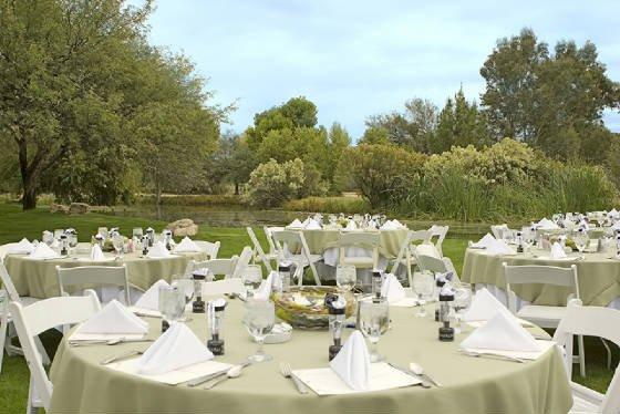 The perfect outdoor wedding venue in a Mesquite grove next to a duck pond!  Your balloon lifts off right next to the pond.