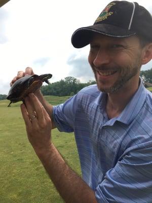 'Crash' the turtle and Paul on the 10th fairway at Cobblestone.