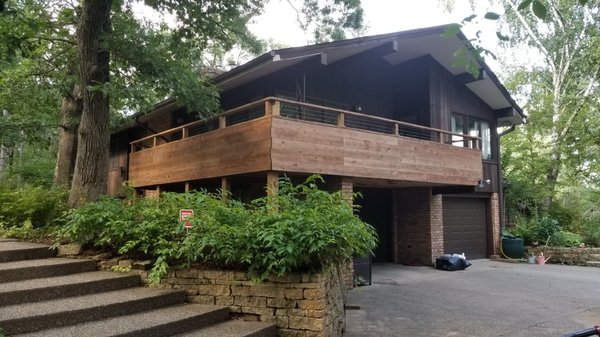 70 year old engineered deck build.  This consisted of a customer handrail using cable rail and Trex Transcend Decking