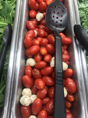 Those tomatoes are probably 2 weeks old.  It's criminal to keep them in the salad bar.