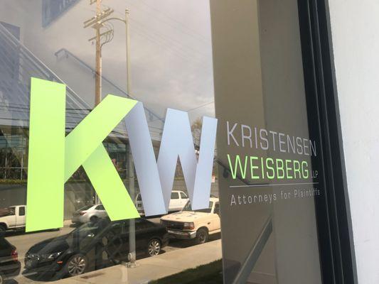 The sign on the entrance to the building to the Kristensen Weisberg LLP office