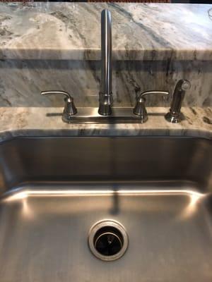 Matt's finished worked on our kitchen sink. Great job!