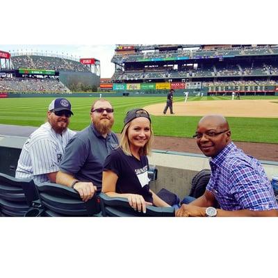 Some of the team enjoying a Rockies game!