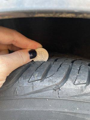 old tire, on rear of my vehicle. Alfred want to leave 3 tires with this tread depth and only replace one tire