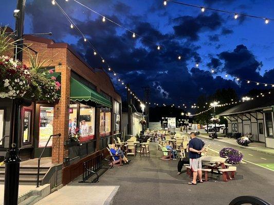 Additional outdoor seating below the lights