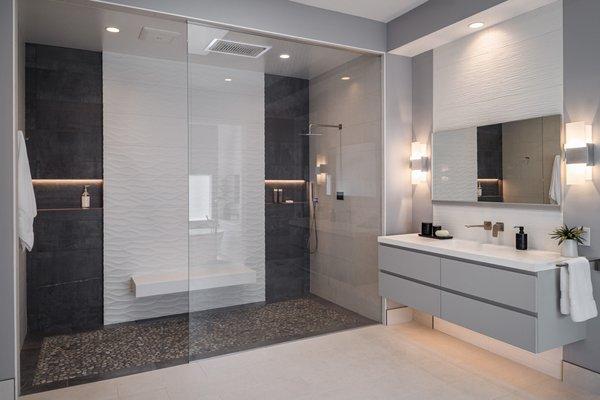 Large shower, floating bench, tempered glass 3/4 wall, pebbled floor, matching linear niches - gorgeous!