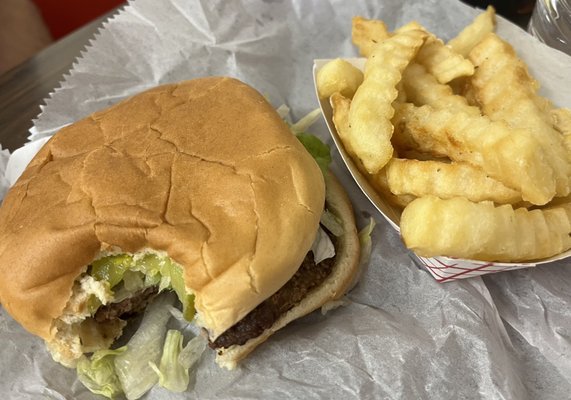 Hamburger and crinkle fries....minus a big bite bcs husband was so hungry he couldn't wait! The buns are SO soft and tasty!