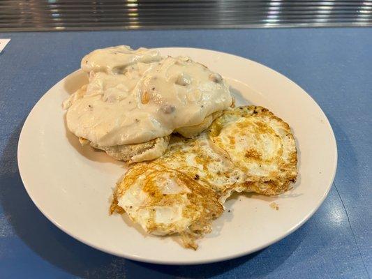 My favorite, sausage gravy biscuit with eggs over easy. You will be full if you eat it all.