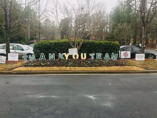 Signage view in parking lot after exiting the facility.