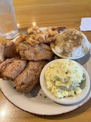 Fried fish, fried shrimp, potato salad, rice and gravy