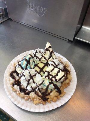 Funnel cake with Boston cream, ice cream, whipped cream and chocolate sauce.  love it!!!